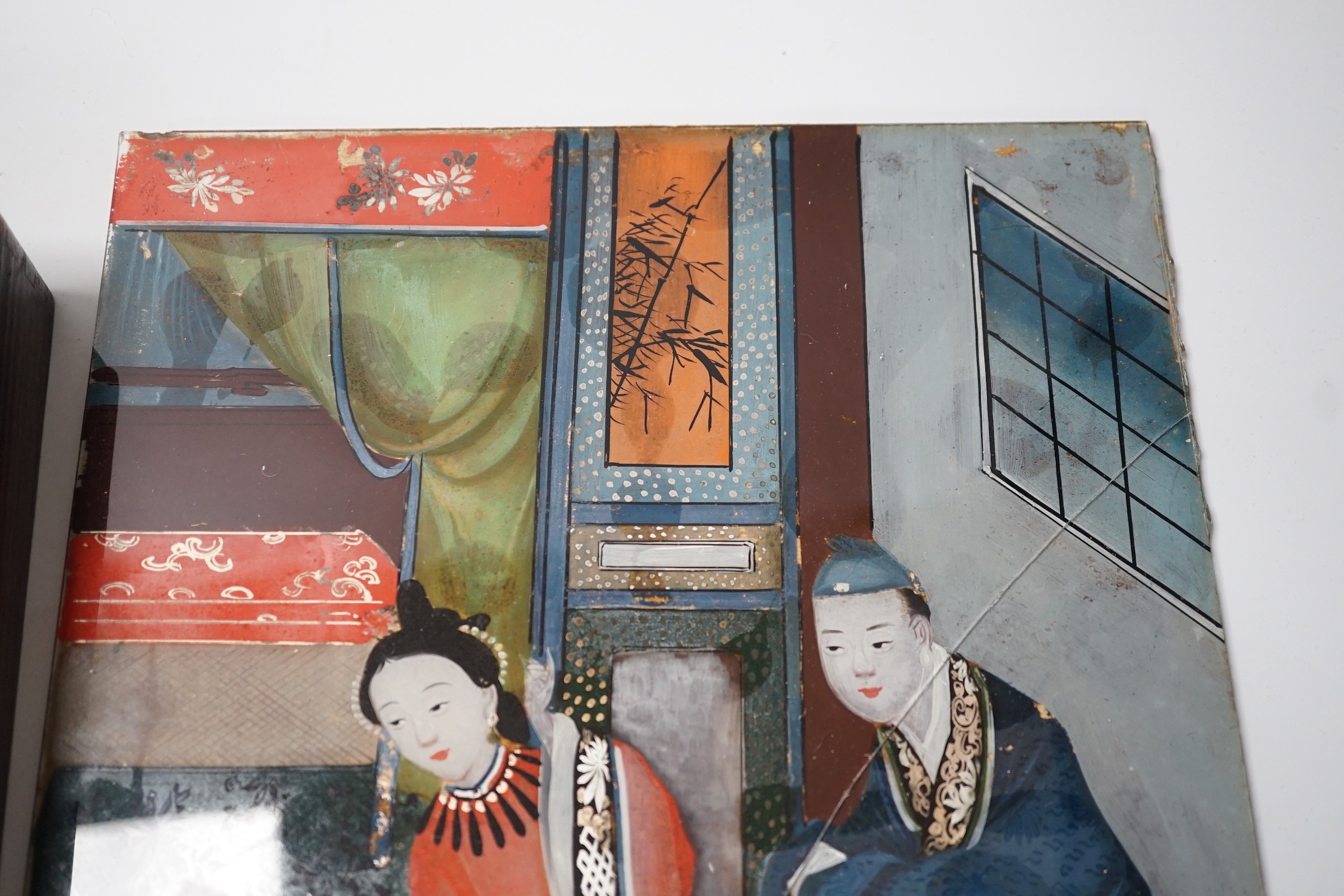 A Chinese reverse glass painting and a box cover with reverse painted glass panel